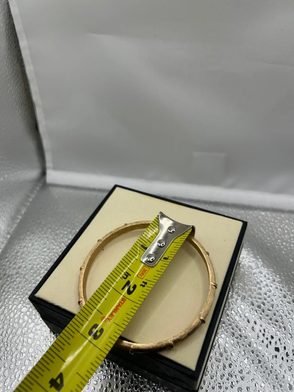 Vintage trifari bangle sleek gold tone brushed texture raised accents classic